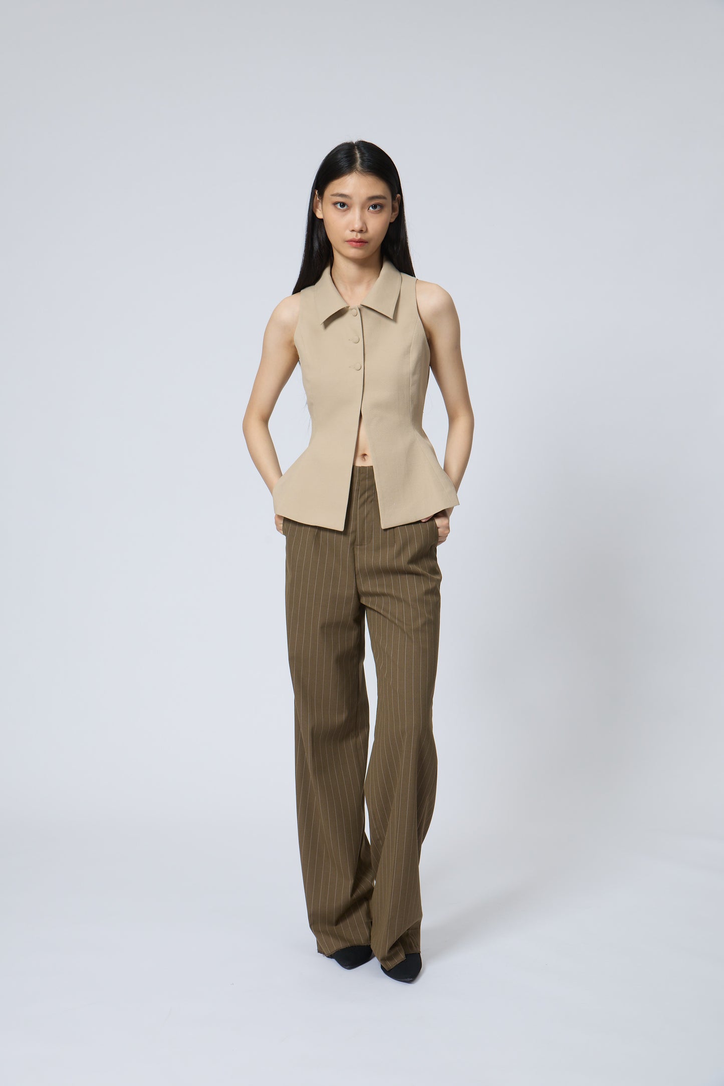 The Peplum Tailored Vest Blouse