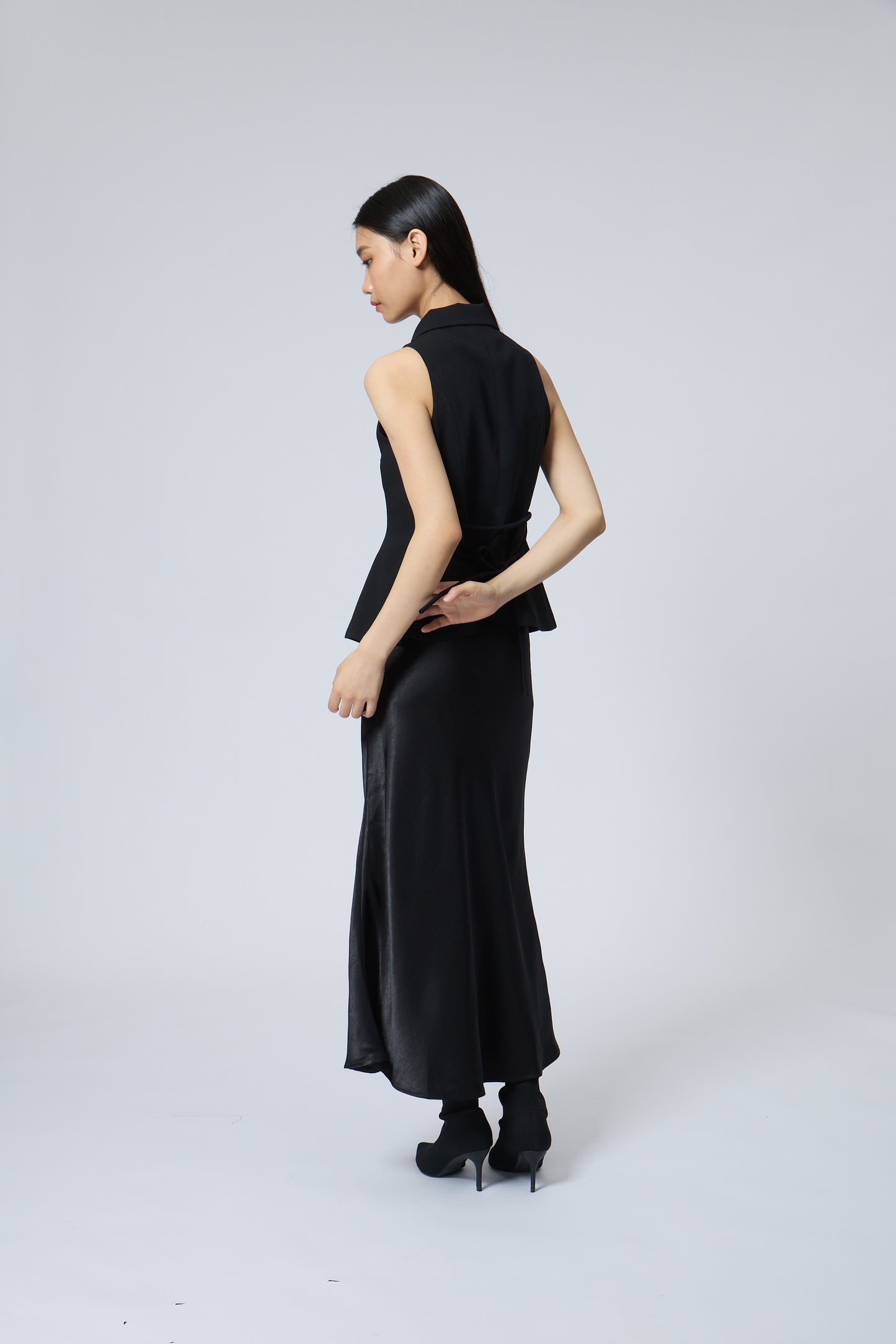 The Peplum Tailored Vest Blouse