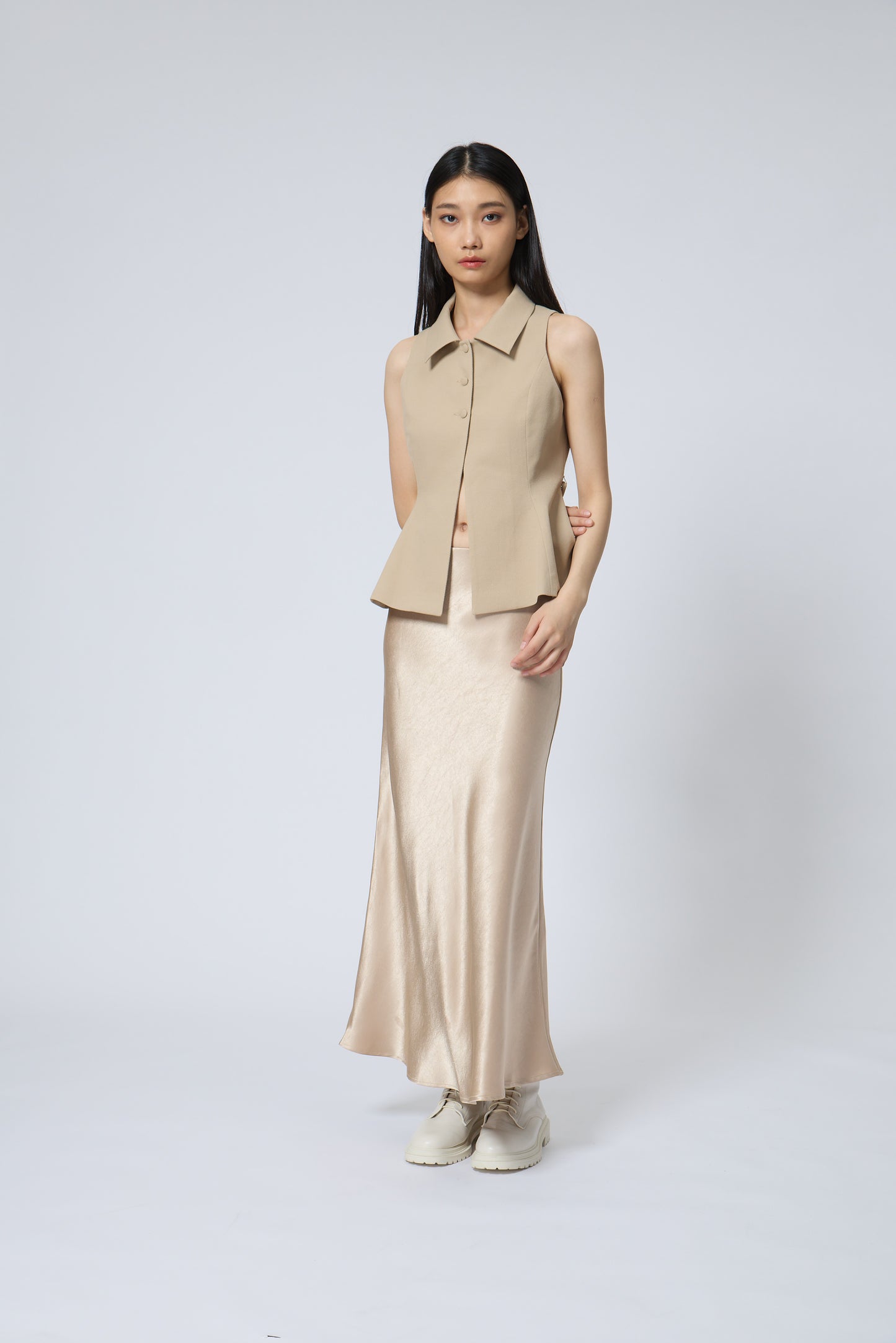 The Peplum Tailored Vest Blouse