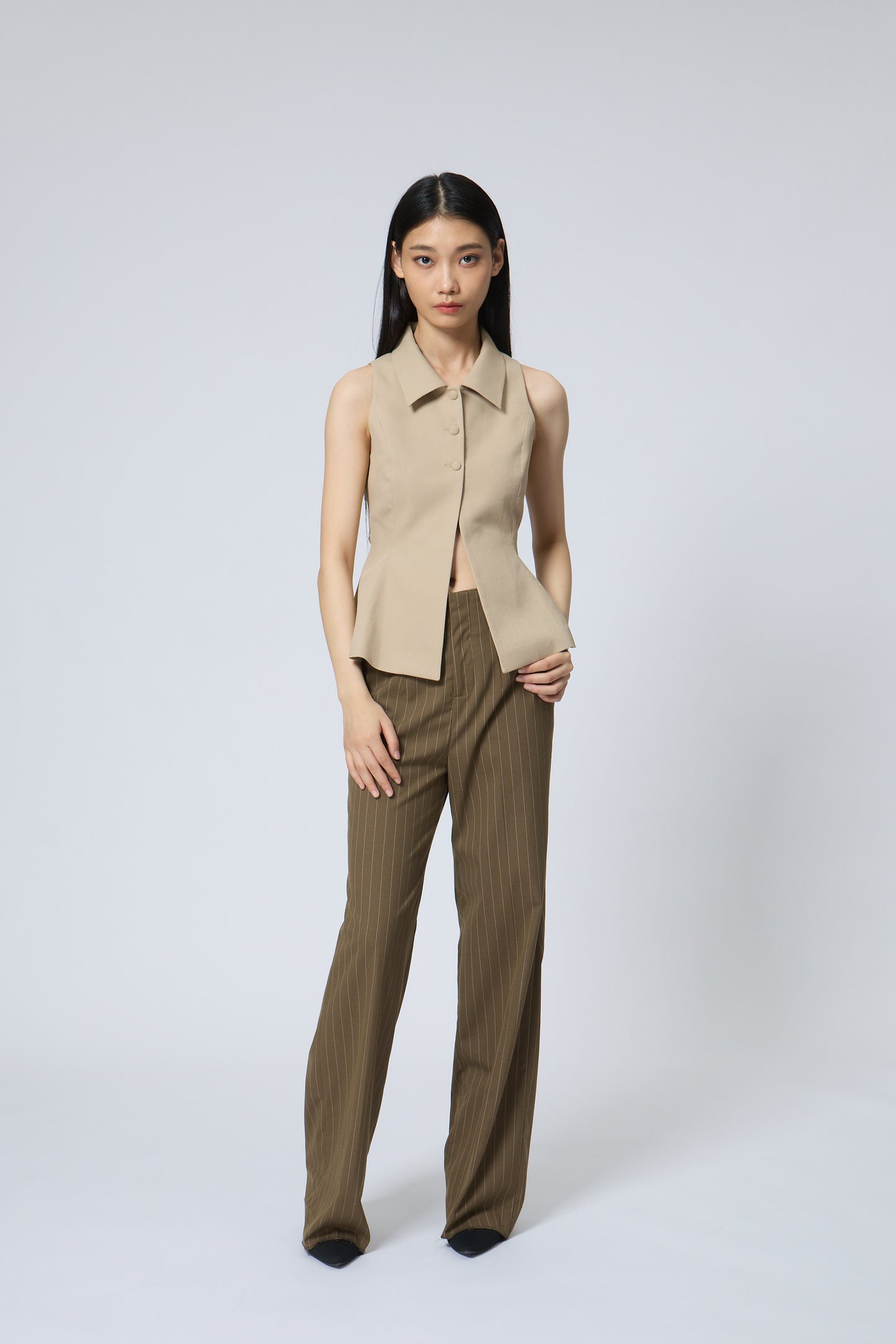 The Peplum Tailored Vest Blouse