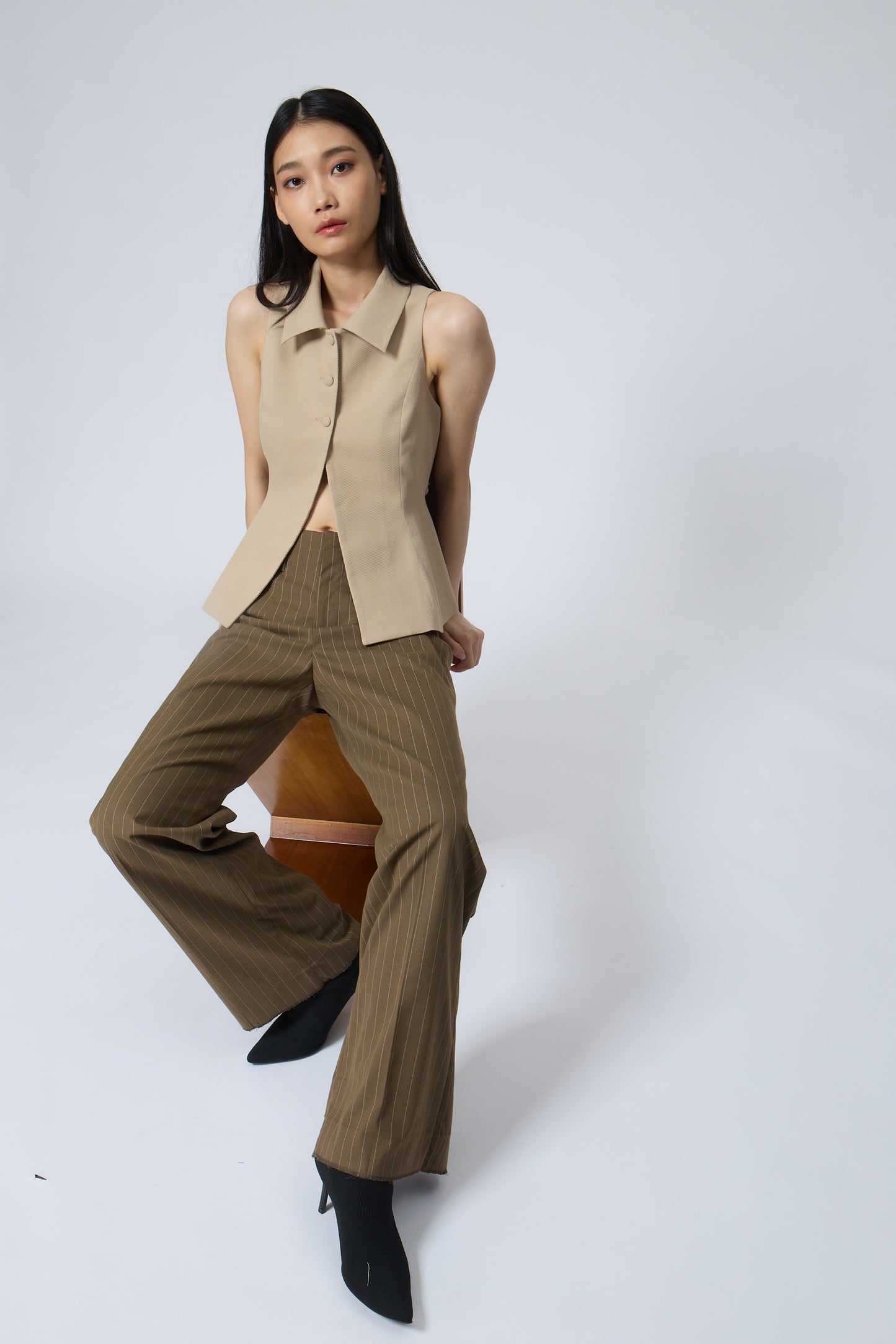 The Peplum Tailored Vest Blouse