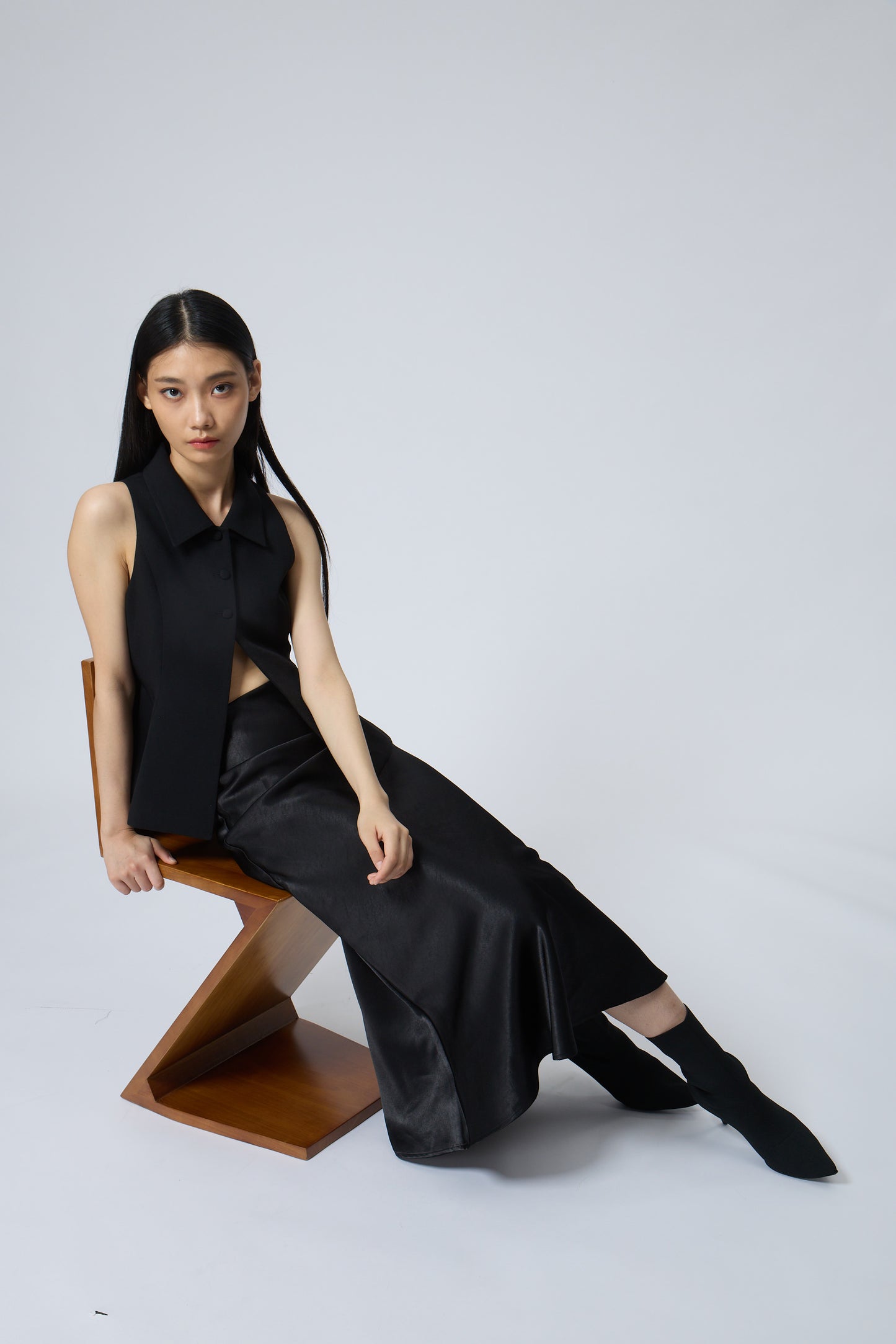 The Peplum Tailored Vest Blouse