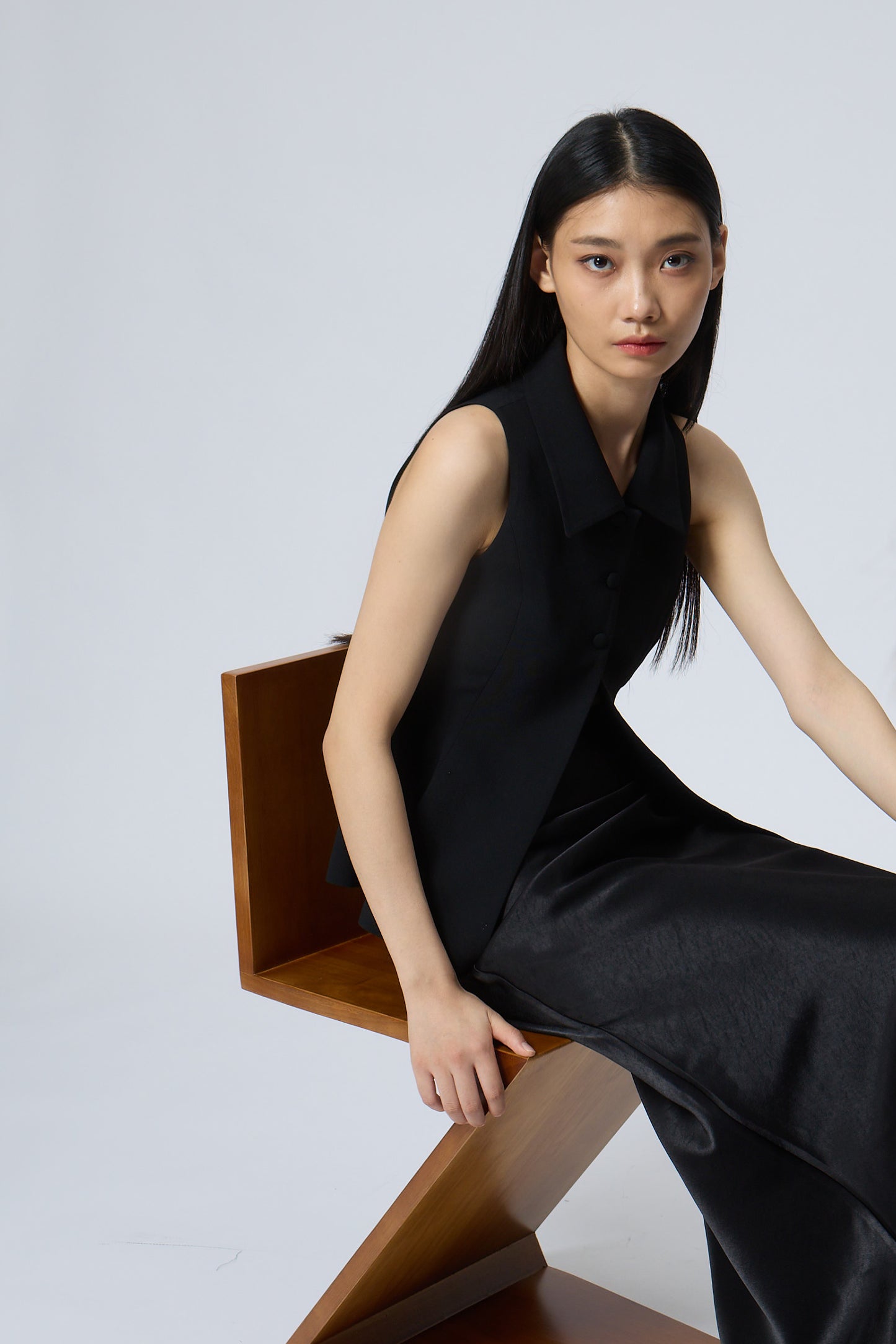 The Peplum Tailored Vest Blouse